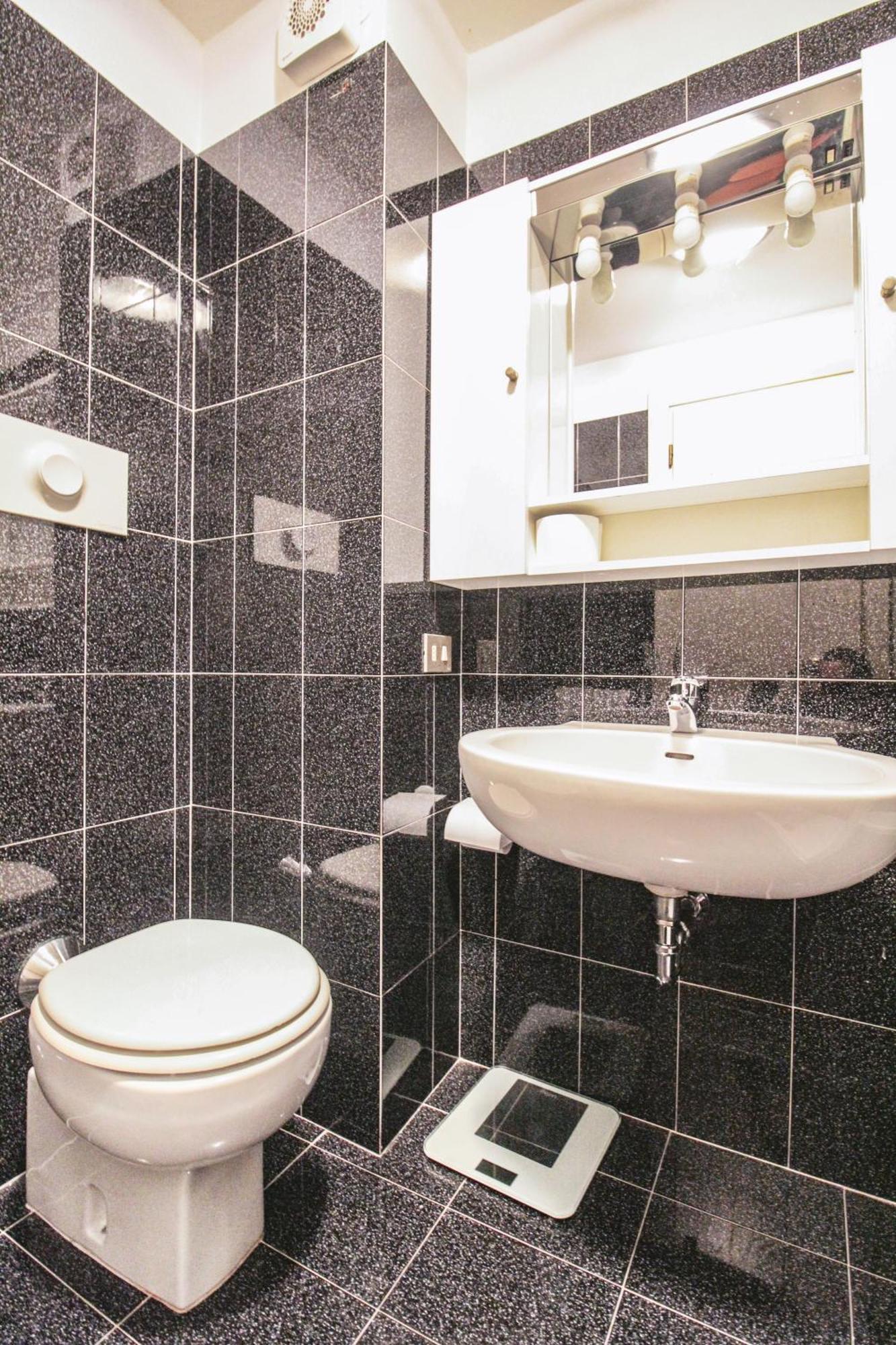 Lario Elegante Apartment Menaggio Bagian luar foto